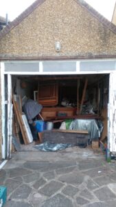 Looking straight at the garage with the old door removed