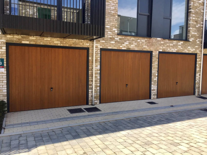 CDC GRP Garage Door Verwood Style in Honey Beech with anthracite grey frames and fully automated