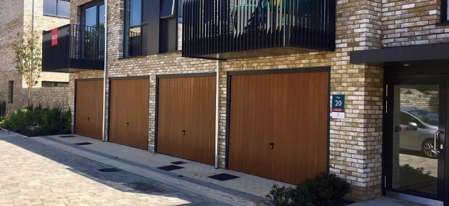 CDC-GRP-Garage-Door-Verwood-Style-in-Honey-Beech-with-anthracite-grey-frames-and-fully-automate