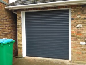 Black Novoroll garage door after installation