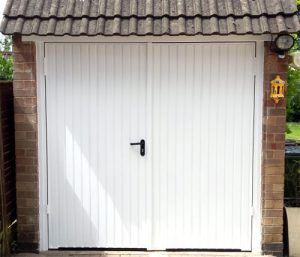 Side hinged garage door
